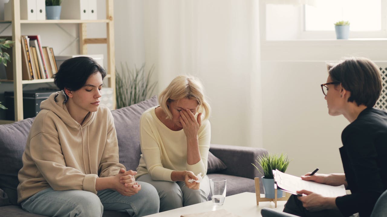 A family together during a supportive counselling session